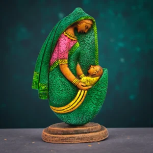 Handcrafted green terracotta mother and child sculpture showing a mother holding her baby, Indian folk art handmade clay home decor statue.