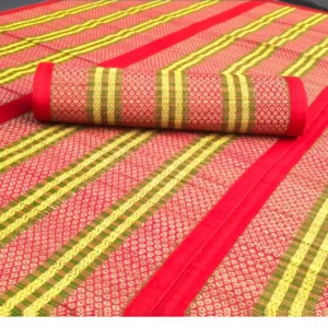 Close-up of Handwoven Korai Grass Madur Mat with Red Border and Traditional Gold Pattern – Eco-Friendly Handmade Mat by Bhumikart
